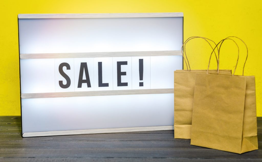 Sale lightbox advert and mini shopping bags